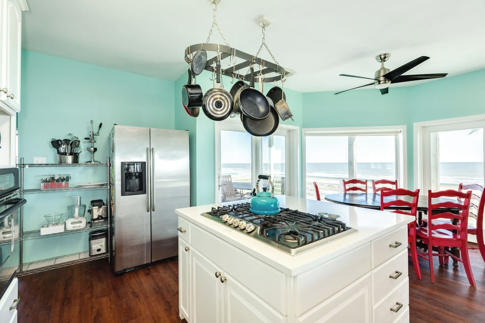Fully equipped kitchen with gas range and stainless steel appliances