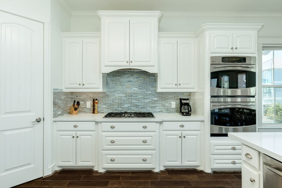 Stainless steel appliances including double oven and gas range