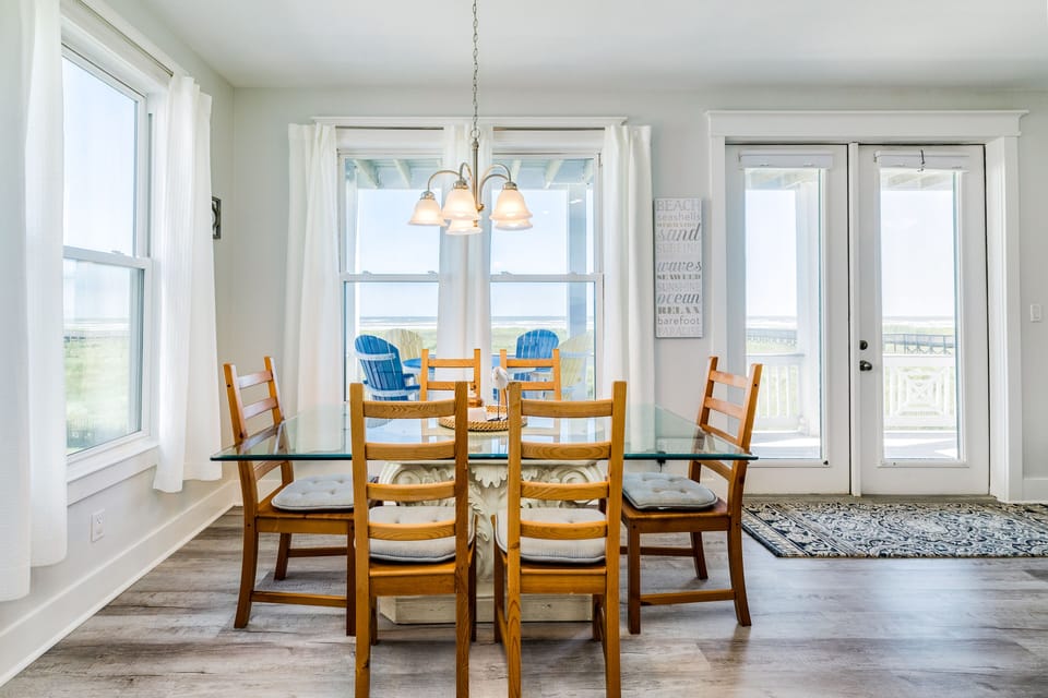Comfortably sit up to 6 at the table overlooking the Gulf