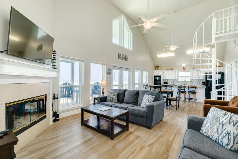 Bright and airy open living area with wall of windows