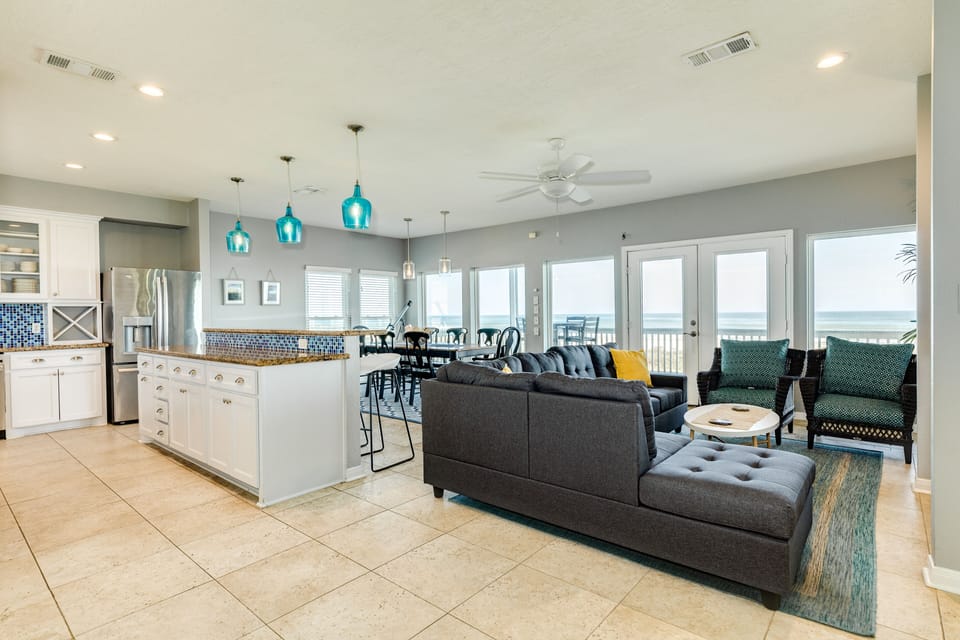 Inviting open living area with wall of windows