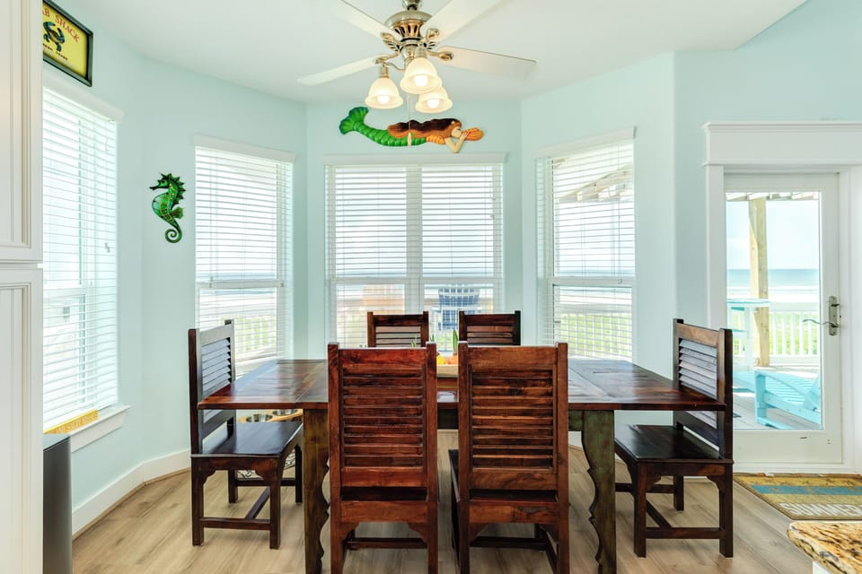 Comfortably sit up to 6 at the dining table overlooking the beach