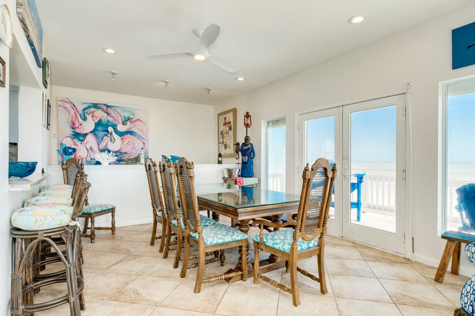 Sit 4 at the counter and 8 at the dining table overlooking the Gulf