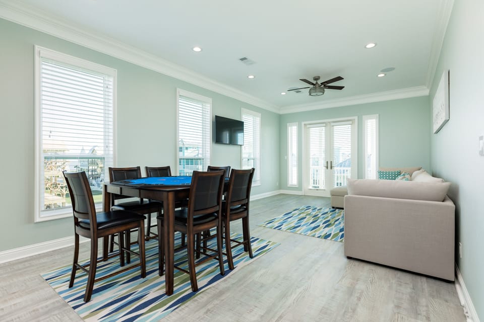 Second living area on Upper level with deck access