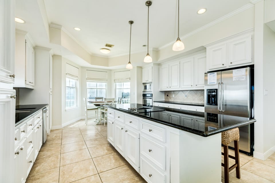 Fully equipped kitchen includes stainless steel appliances and plenty of prep space