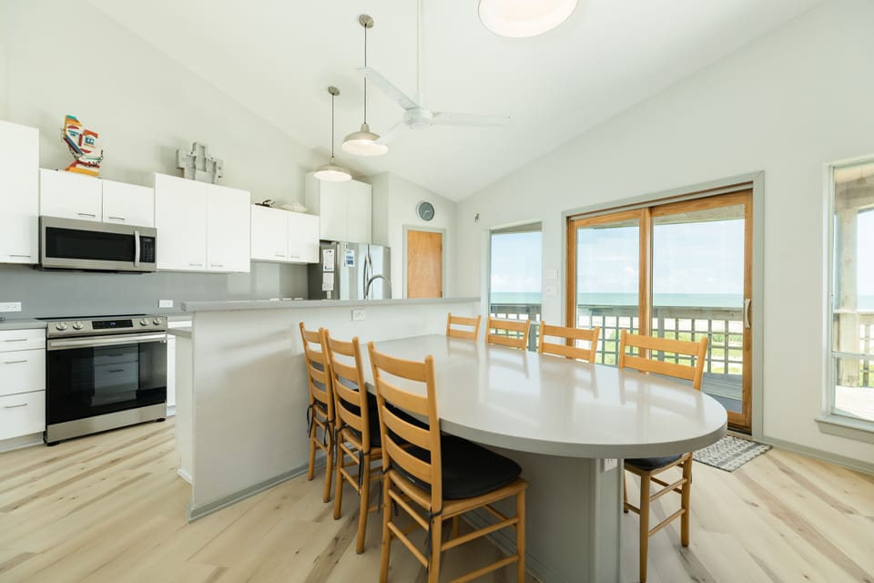 Sit up to 7 at the dining area overlooking the beach