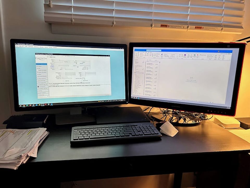 Twin monitors, laptop dock & key board, lets you work from the country rental.