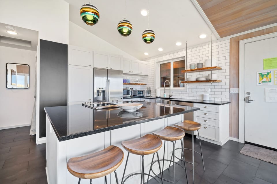 Gather around the island to join in the cooking fun.