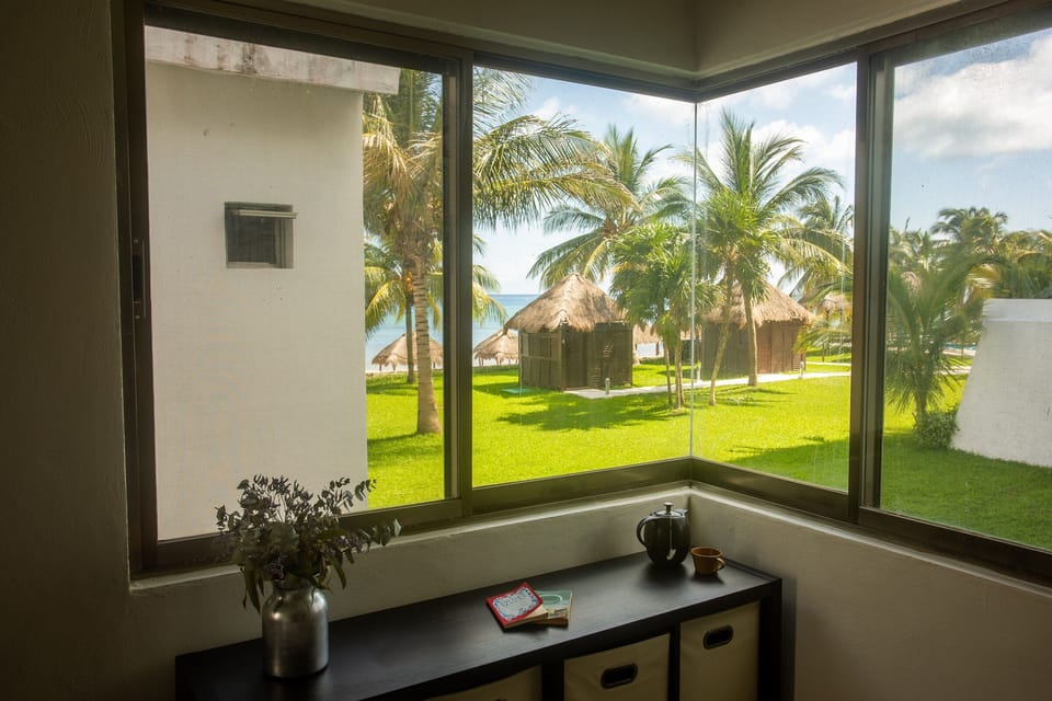 Room 2: 
Ocean view. Queen Bed,  A/C, closet and bathroom
