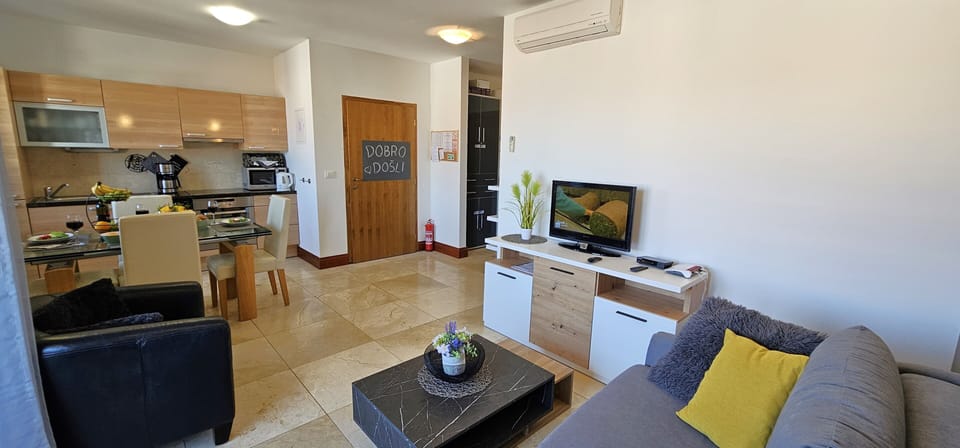 Open plan living/dining and kitchen area