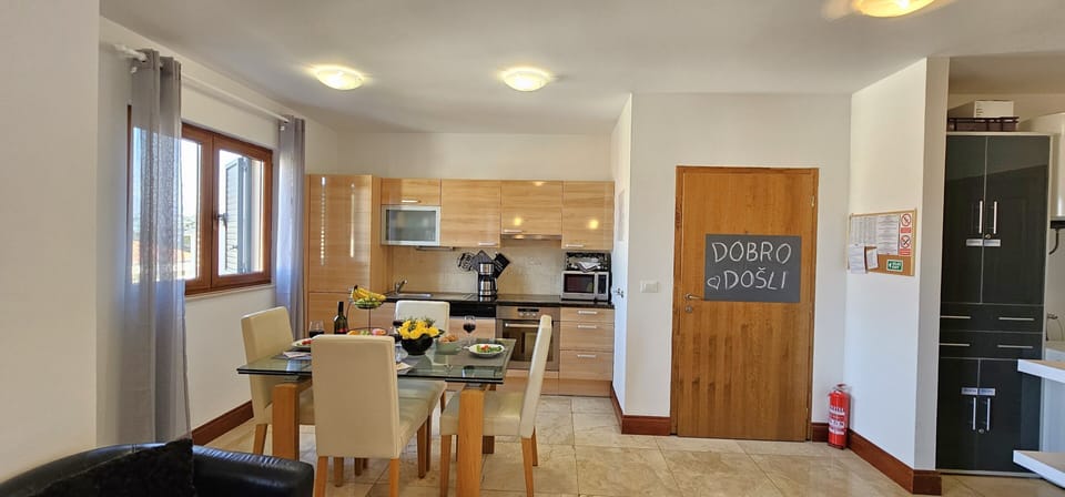 Open plan living/dining and kitchen area