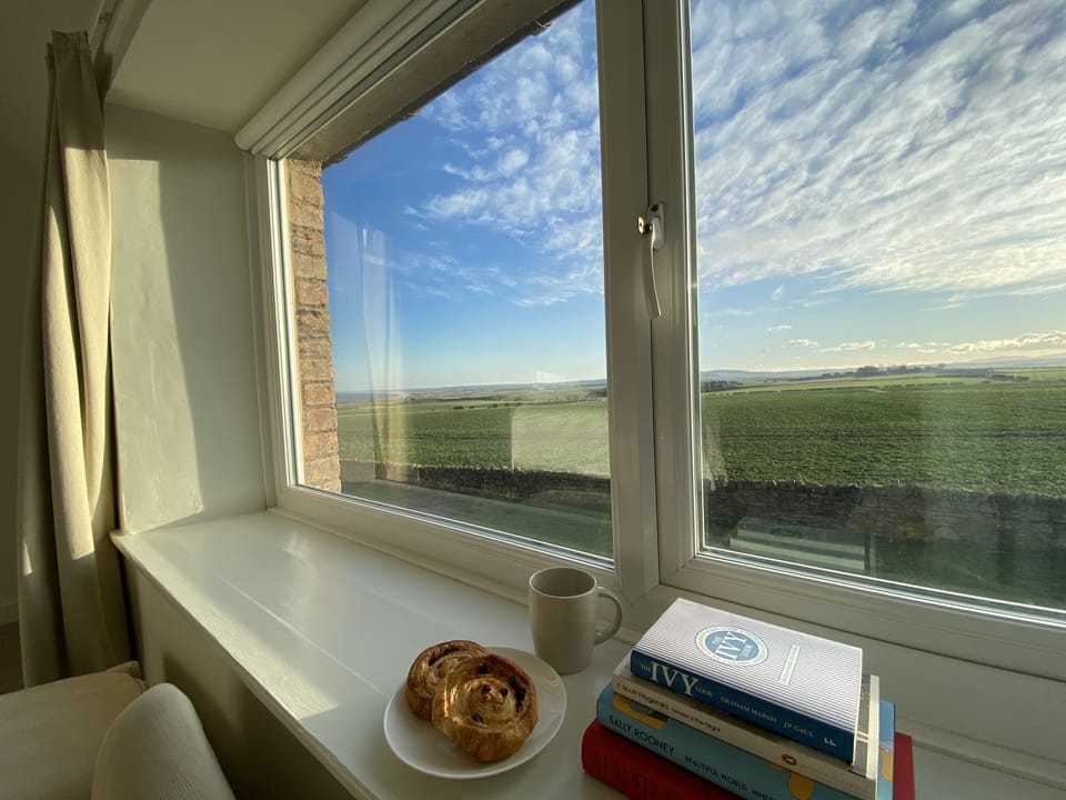 View from the reading nook in master bedroom, out to sea and down the coast