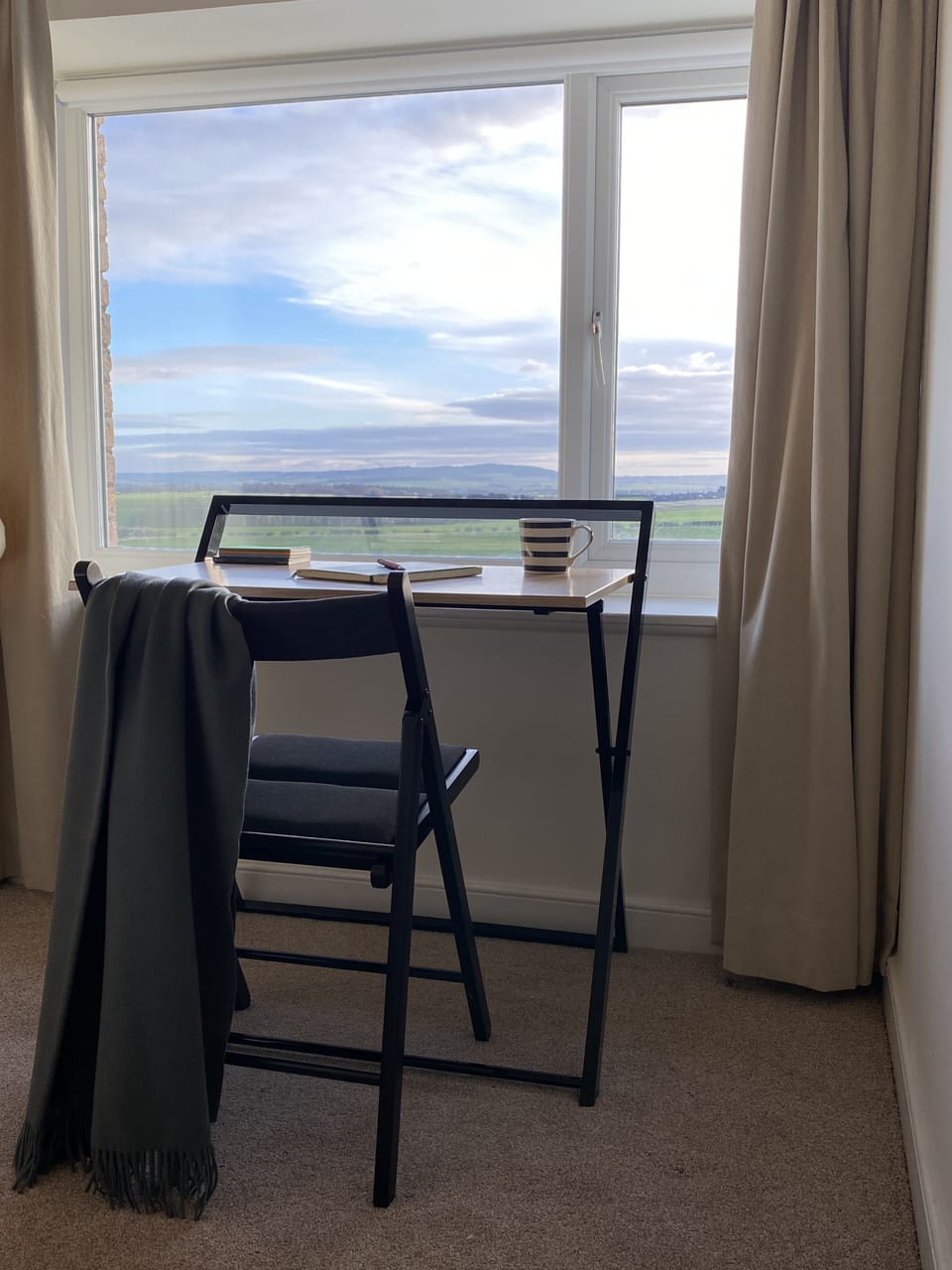Foldaway workstation if you need a desk (with a view!). Stored away in cupboard