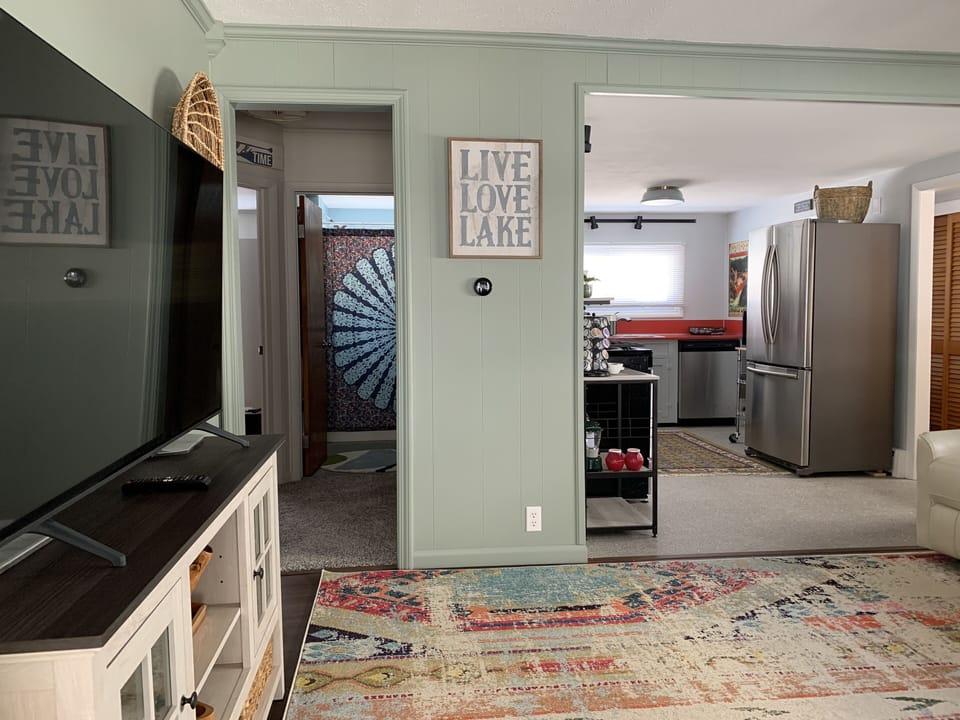 Living Room to Hallway and Kitchen View