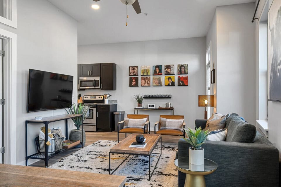 Spacious living room with Queen pullout couch, dining table with seating for 6, HD TV with YouTube TV for cable and all the apps you could want & a walkout private patio with seating for 2.