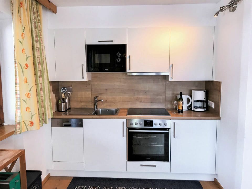 Brown, Cabinetry, Countertop, Kitchen Sink, Property, Sink, Tap, Furniture, Kitchen Stove, Building