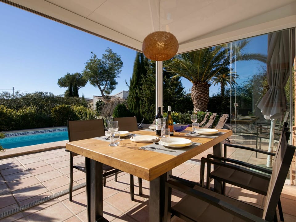 Table, Sky, Furniture, Property, Plant, Azure, Outdoor Table, Outdoor Furniture, Shade, Interior Design