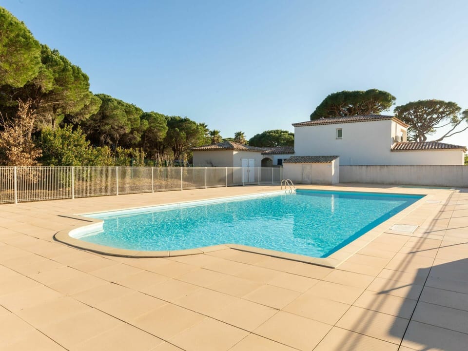 Water, Sky, Property, Swimming Pool, Azure, Building, Tree, Shade, Rectangle, Composite Material