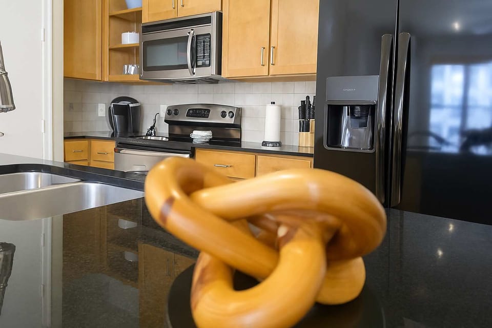 Close-up view of kitchen island with modern decor centerpiece