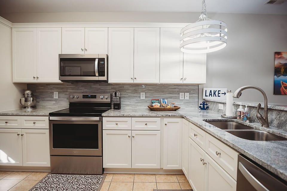 Recently updated fully equipped kitchen with stainless appliances.