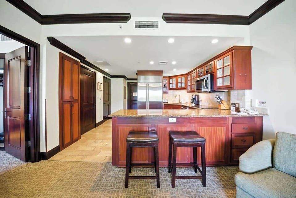 Spacious bar seating blends style and functionality for island living