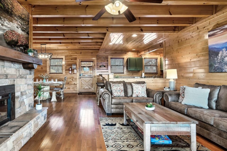 Beautiful living area open to kitchen and dining room.  Electric fireplace!