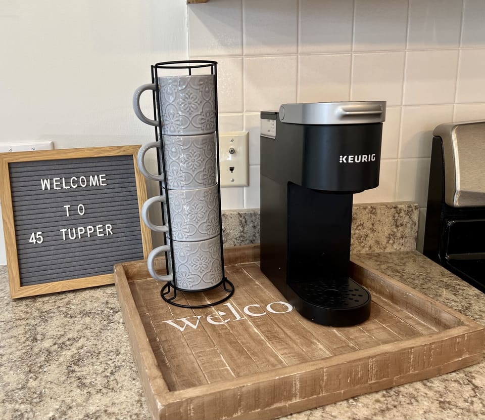 Keurig and 12 cup coffee maker on site