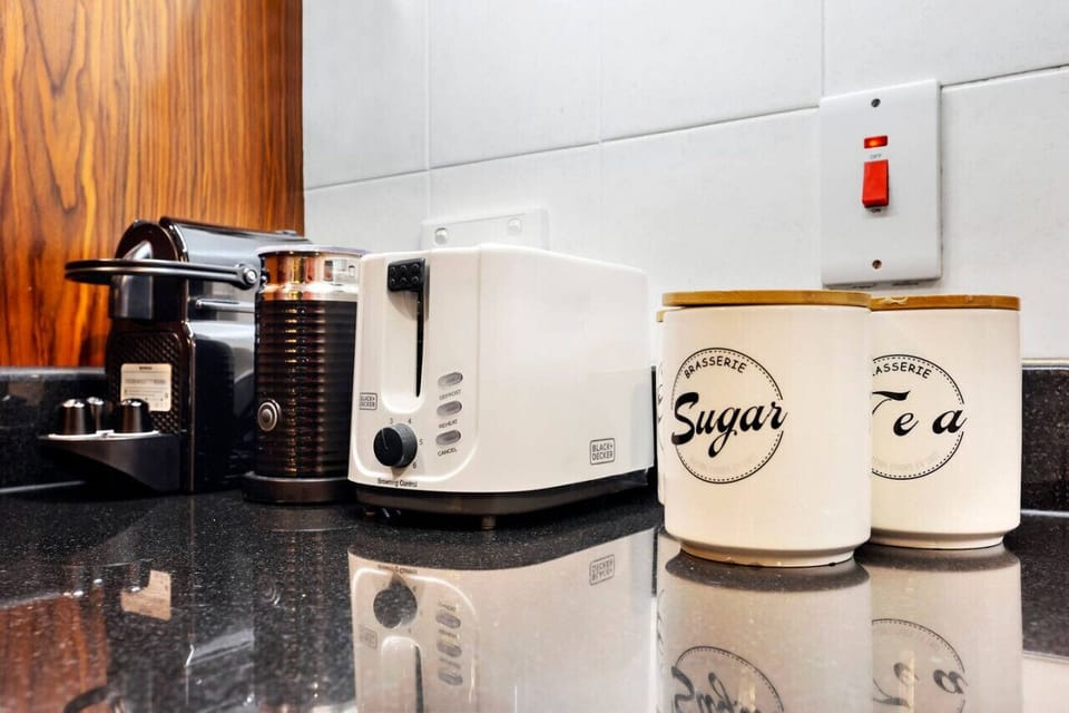 Kitchen Nook: Whip up breakfast magic with modern appliances and charming storage!
