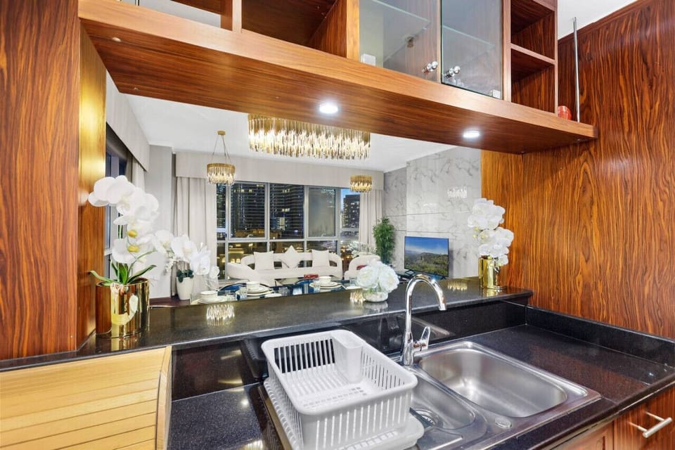 Kitchen: Sleek cabinetry and designer lighting make this space a chef`s dream!