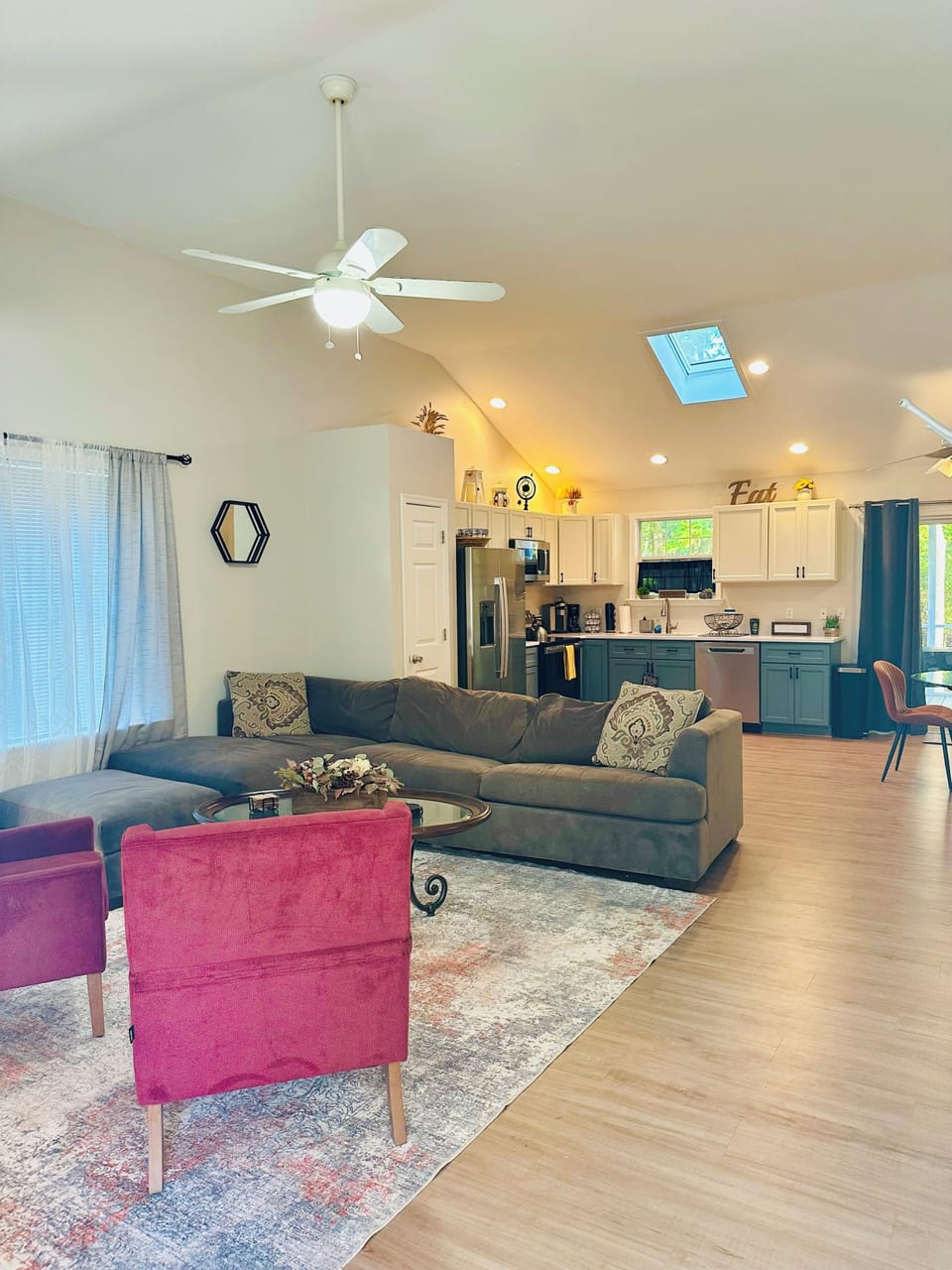 Bright, comfy living room perfect for relaxing after the beach.
