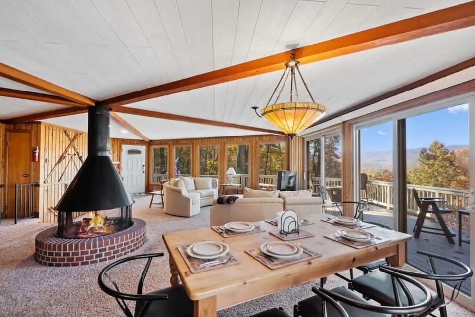 The living space from where you will be able to enjoy the mountain view with a 360 degree fireplace