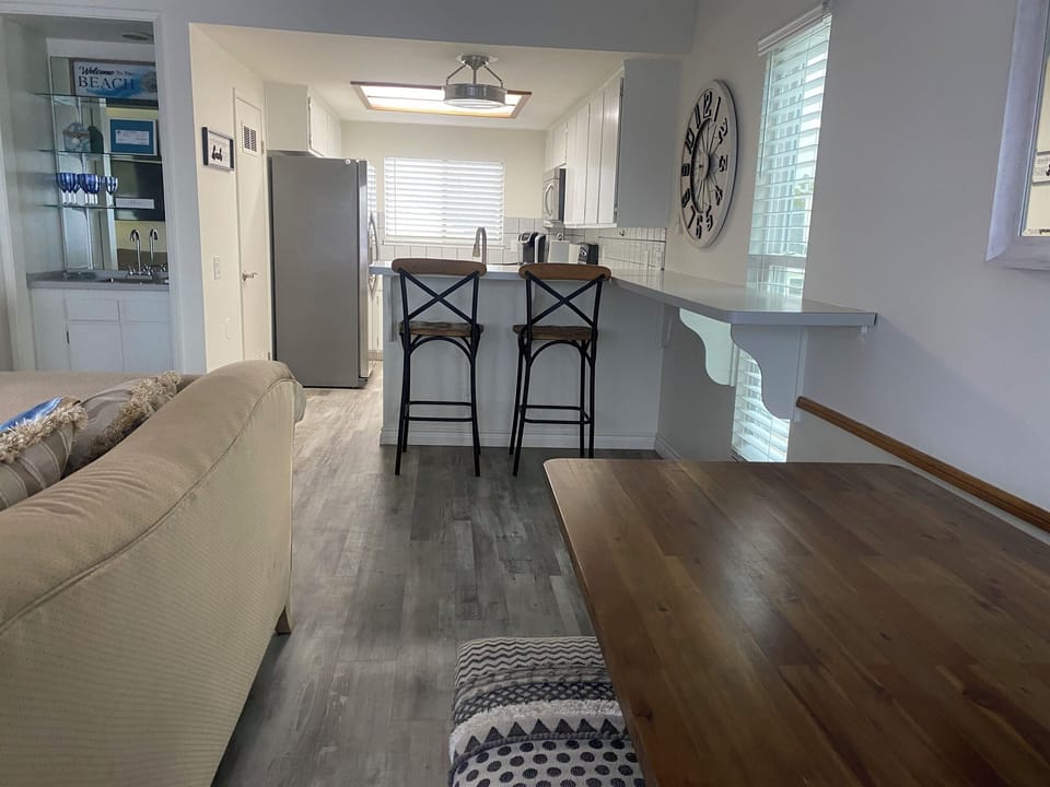 Dining space and extra seating at kitchen counter.