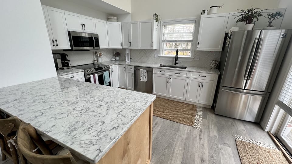 Full gut and remodel kitchen with a newly built island for added space 