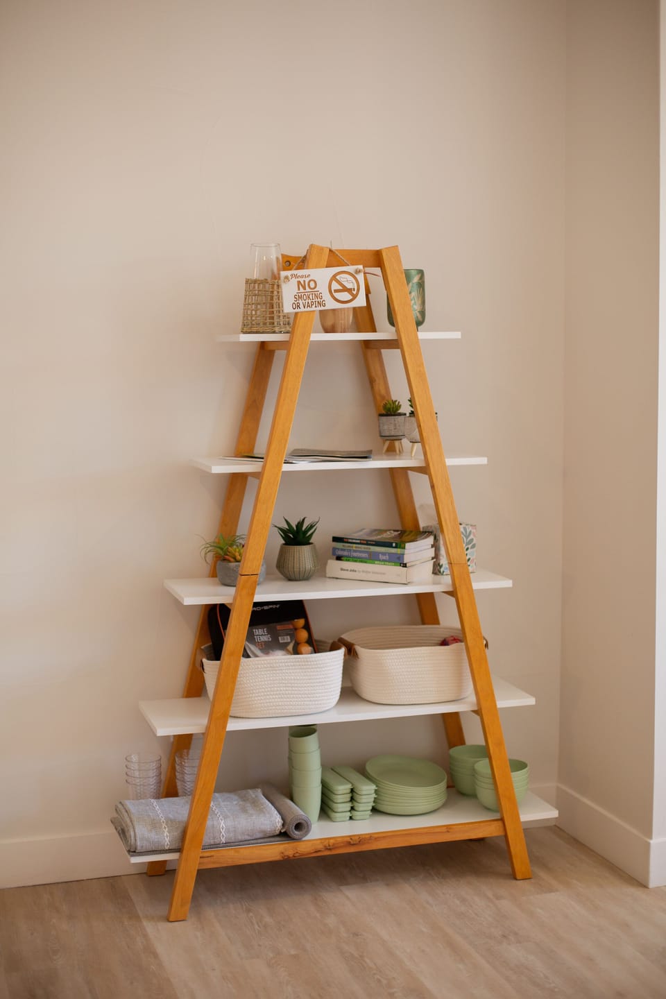 Office shelves with plenty of plates, cups, etc to entertain