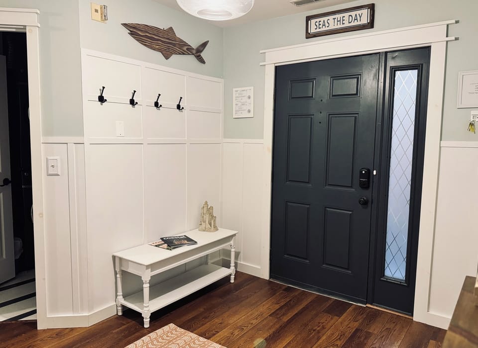 Main entry.  Find beach chairs, water toys, 2 fish poles, crab gear in closet.