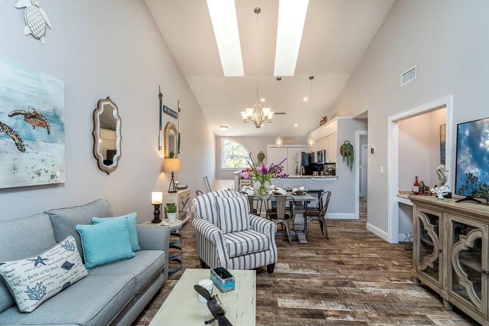 Tasteful Beach Motif throughout the Living Area which overlooks the Waters of the Bay
