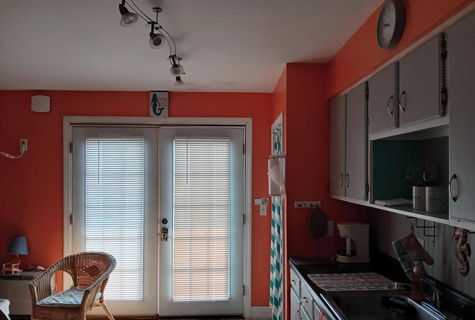 stocked kitchen. east side entrance