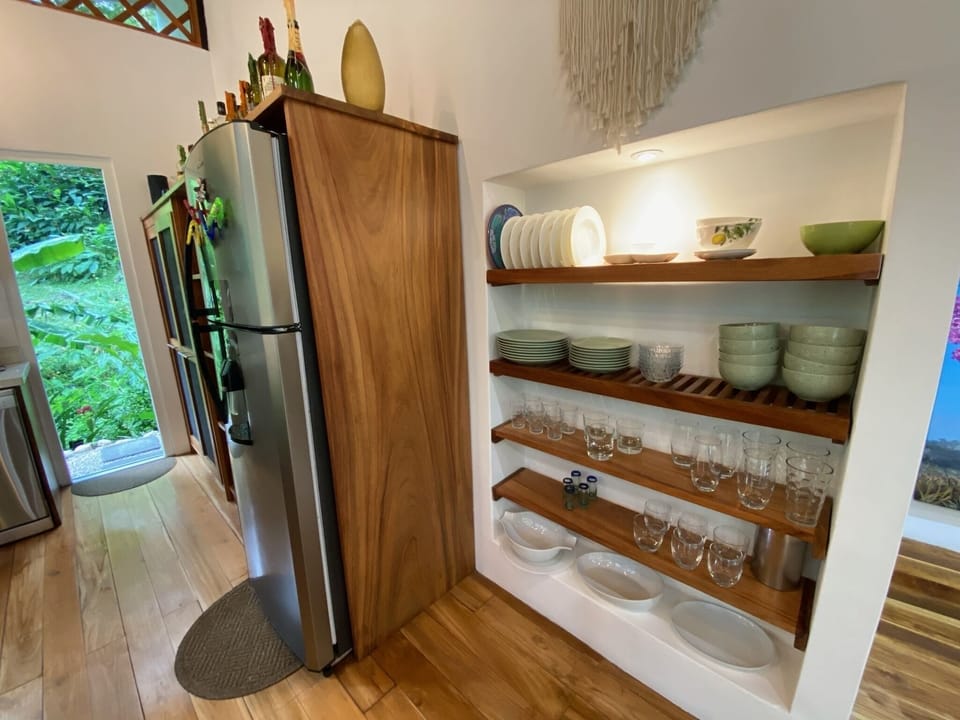 Tablewere rack and fridge.