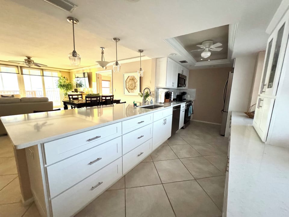 Kitchen area looking out to the living room and beach