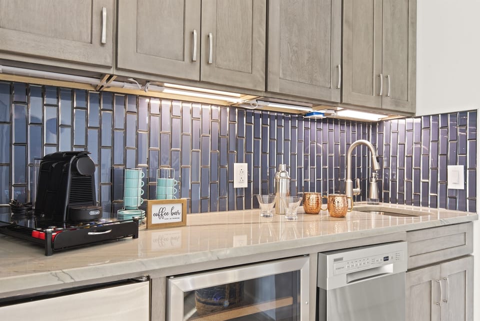Ice maker, dishwasher and an array of cocktail and mocktail supplies!