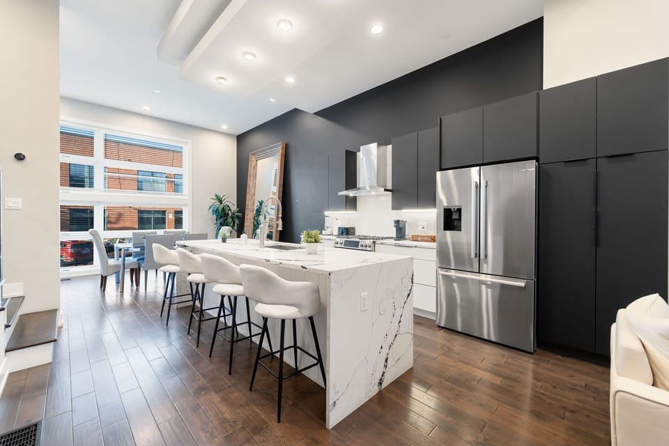 Modern kitchen view emphasizing clean surfaces and smart design details.
