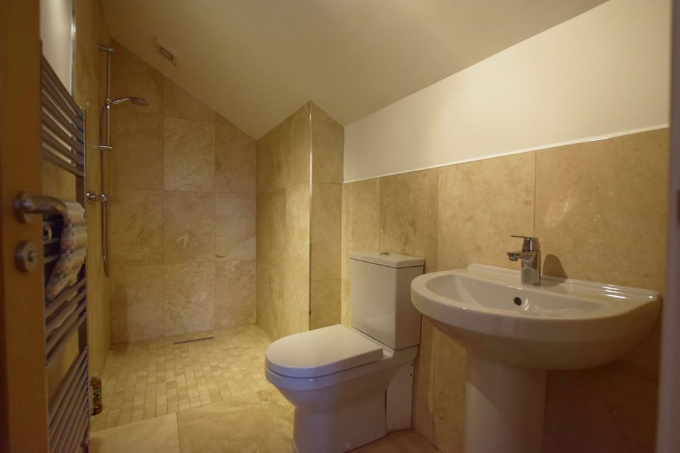 All bathrooms are finished to a high spec, with heated towel rails.