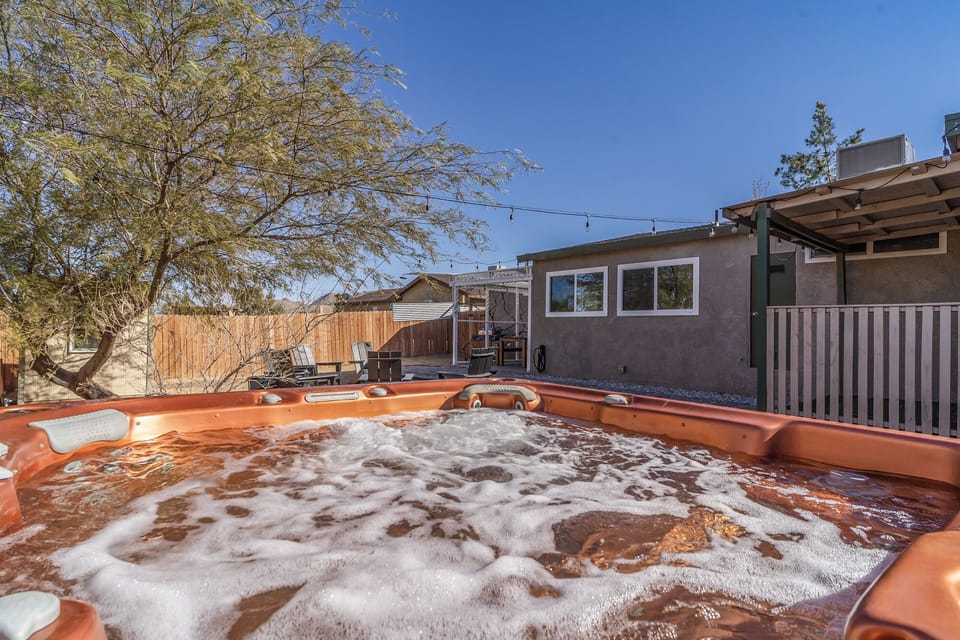 7 person XL Jacuzzi hot tub in the back yard