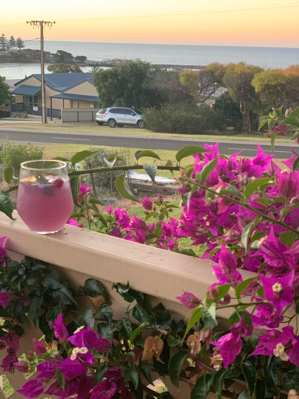 Watch the sunset through the  pretty Bougainvillea on verandah 