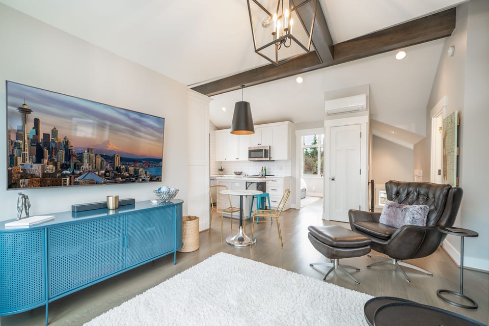 55" TV connected to Wi-Fi with enhanced sound system.