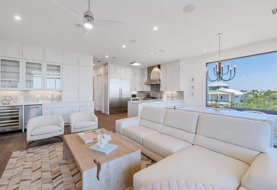 Open floor plan with living, kitchen and dining