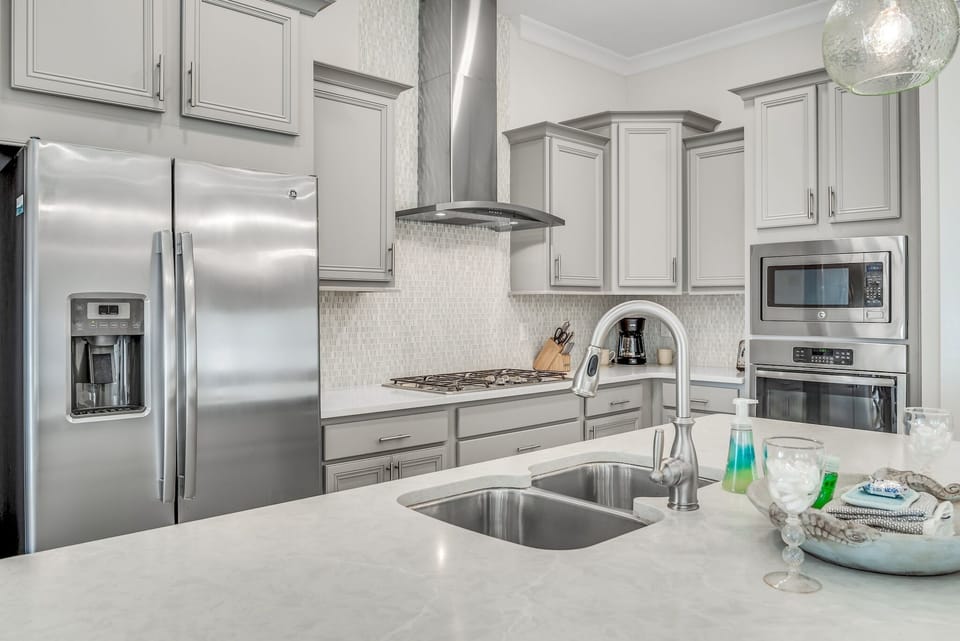 Kitchen with traditional coffee maker as well as Keurig