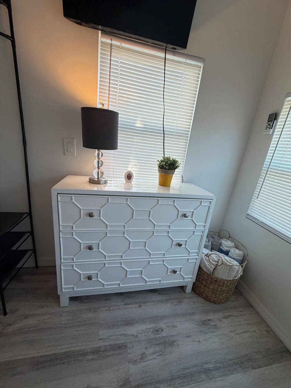 Bedroom, dresser, and TV