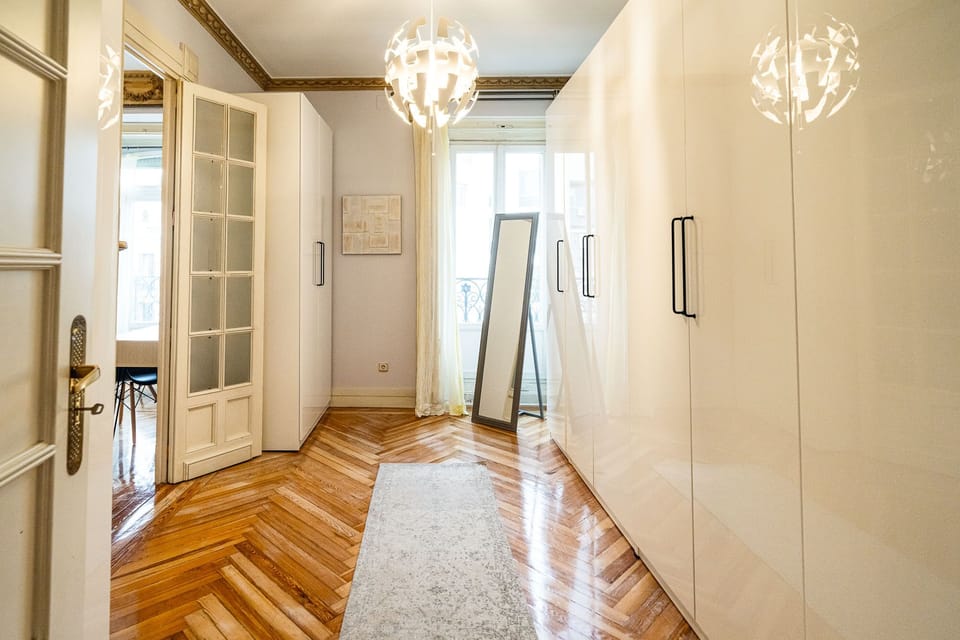 There's tons of storage for you in this amazing modern dressing room