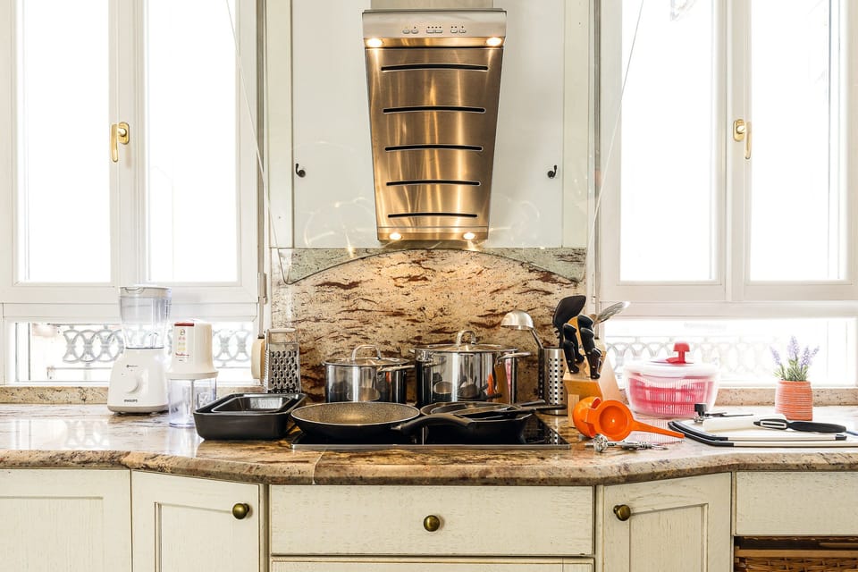Fully equipped kitchen with many utensils provided